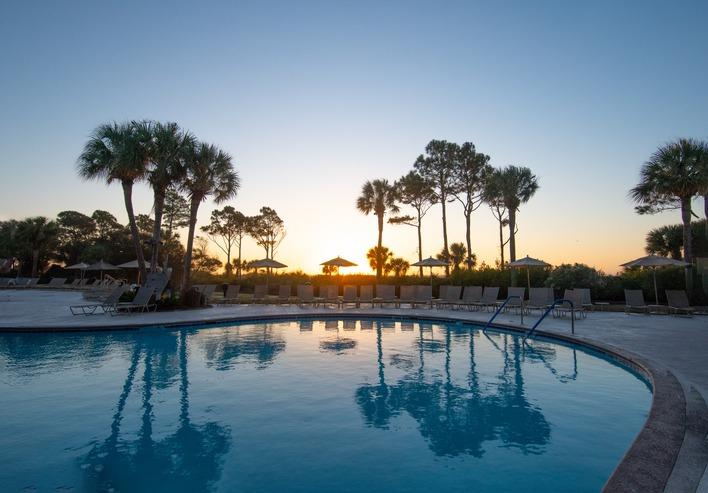 View of sunrise in Hilton Head Island, SC from a private pool vacation rental.